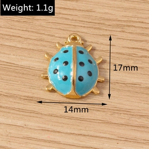 Blue ladybug pendant detail with 17mm x 14mm dimensions and 1.1g weight display