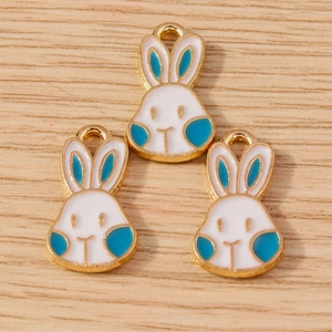Three gold-plated rabbit head charms with white and sky blue enamel for DIY jewelry