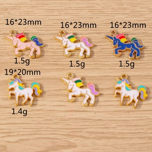 Detailed view of colorful unicorn charms with 16x23mm and 19x20mm dimensions