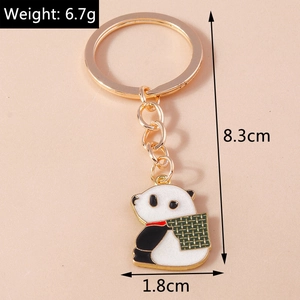 Detailansicht eines Panda-Schlüsselanhängers mit Maßangaben und Gewichtsdetails