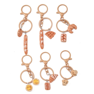 6-piece creative simulated bread keychain set featuring baguette, croissant and waffle