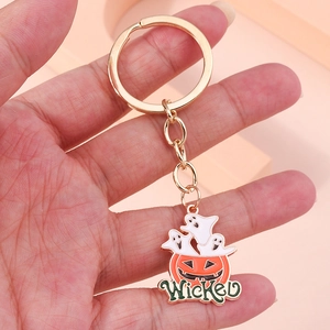 Halloween pumpkin and ghost keychain with Wicked lettering in gold enamel finish