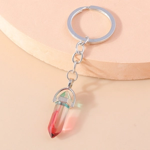 Detail shot of a gradient crystal hexagonal column keychain with silver metal ring