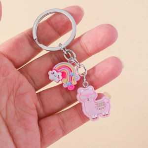 Cute rainbow alpaca keychain with pink llama and cloud charms for bags and accessories