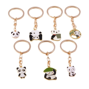 Set mit 7 Cartoon-Riesenpanda-Schlüsselanhängern mit Goldmetallkanten und Emaille-Design