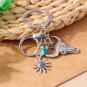Western Bohemian keychain with bull skull, sunflower charms and turquoise stones