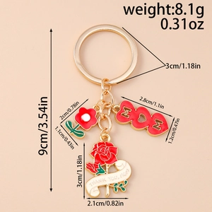 Detailed view of Mother's Day gold keychain with MOM charms and size measurements