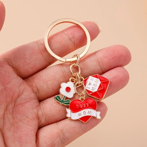 Detail of MOM keychain with rose flower, best mom heart and love letter envelope charm