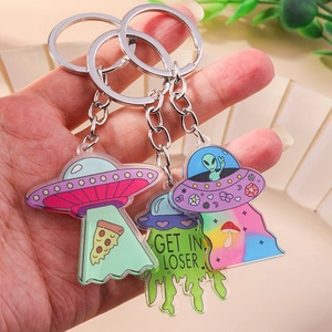 Three-piece acrylic UFO keychains with Get In Loser slogan and alien spaceship designs