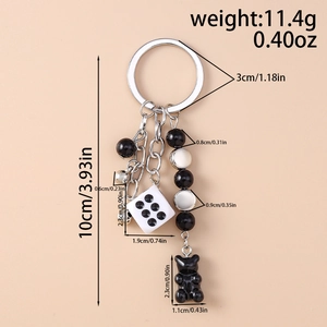 Detailed size specifications for the bear and dice keychain with measured dimensions