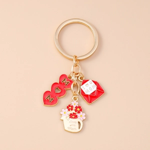 Detailed macro view of MOM enamel key ring with pink rose basket and love heart envelope