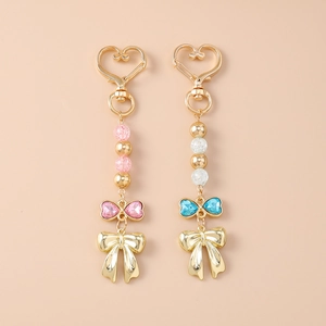 Porte-clés en Alliage de Zinc Coeur Noeud Papillon Strass Perles Exquis Doux Pendentif de Sac pour Femmes Filles Décoration Quotidienne Cadeau