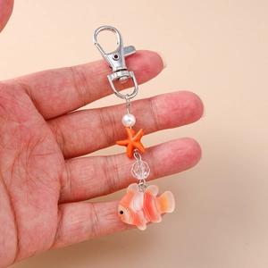 Porte-clés mode thème océan avec breloques étoile de mer, poisson-clown et perles