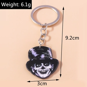 Close-up of Halloween keychain showing skeleton character charm and metal ring