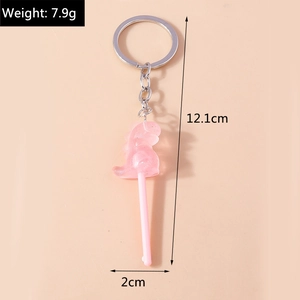 Pink resin dinosaur lollipop keychain detail with 7.9g weight and 12.1cm length markers