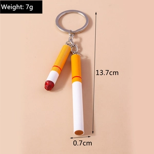 Detail view of 13.7cm creative cigarette keychain with red lit effect and silver ring