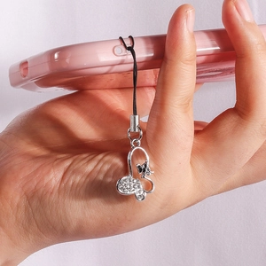 Sparkling rhinestone butterfly phone charm in silver metal with black lanyard for phone cases