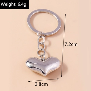 Silver metal heart keychain dimensions with circular ring and solid pendant detail