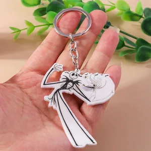 Detail of Jack Skellington acrylic keychain with metallic ring on a natural background
