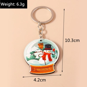 Détail du porte-clés boule de neige de Noël avec dimensions de 10,3 cm de haut et poids 6,3 g