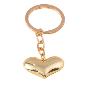 Elegant 3D heart-shaped gold keychain with polished metal finish on white background