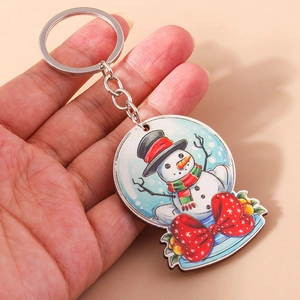Porte-clés créatif boule de cristal bonhomme de neige de Noël avec nœud à pois rouges