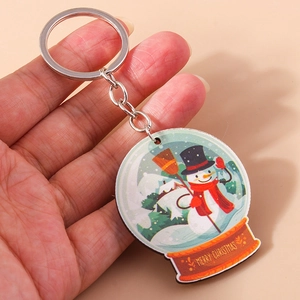Porte-clés boule de cristal de bonhomme de neige de Noël avec texte de vœux festif
