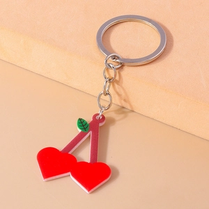 Simpatico portachiavi a ciliegia a forma di cuore rosso con foglia verde e anello argento