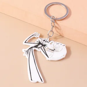 Detail of Jack Skellington acrylic keychain with silver metal ring on orange blocks