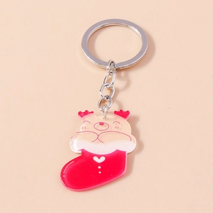 Close-up of a cute cartoon bear in a red Christmas stocking acrylic keychain charm