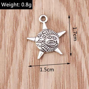 Detailed size view of vintage celestial sun moon charms in antique silver finish