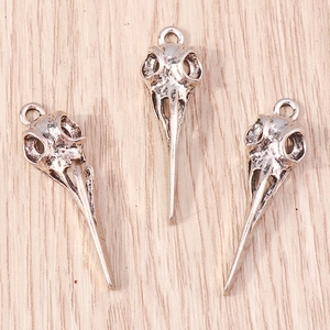 Three vintage silver bird skull pendants for DIY Halloween jewelry accessories and crafts