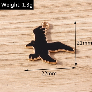 Detailed view of black enamel bird charm with gold edges and precise size dimensions