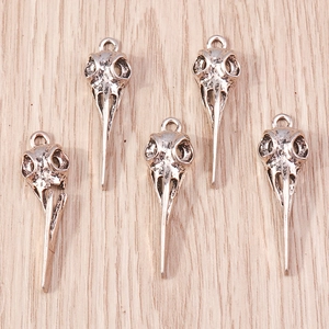 Set of 5 gothic bird skull pendants in antique silver alloy for Halloween jewelry DIY