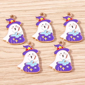 Detail of Halloween ghost and magic cauldron enamel charms for DIY jewelry crafts
