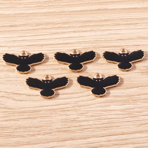 Five black owl alloy charms with gold plating and enamel finish for DIY jewelry crafting