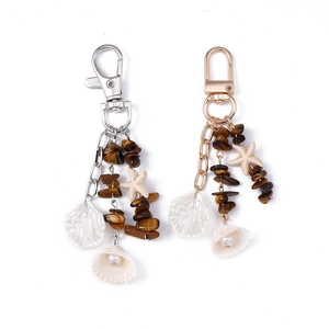 Set portachiavi a stella marina con conchiglie e perle in finiture oro e argento