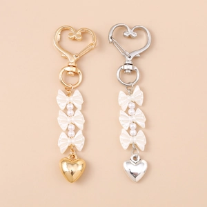 Portachiavi Dolce a Forma di Cuore Stile Ins Con Perla Artificial d'Imitazione e Fiocco Ciondolo a Cuore in Lega di Zinco per Donne