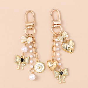 Vintage Gold Alloy Bowknot Heart Keychain For Women Elegant Imitation Artificial Pearl Rhinestone Bag Pendant Fashion Jewelry Accessory