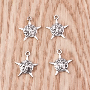 Set of four vintage silver sun face star charms for DIY jewelry making and crafts