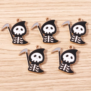 Detail view of 5-piece cartoon reaper charms with black and white enamel for DIY jewelry