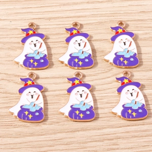 Detail of cute ghost charms with purple wizard hats and cauldrons for Halloween DIY crafts