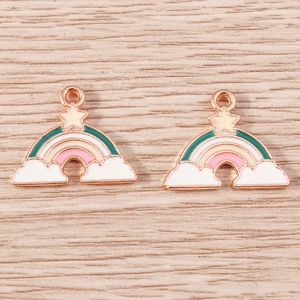 Detailed macro view of colorful rainbow and star charms for DIY jewelry making