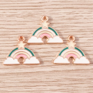 Detailed macro view of colorful enamel rainbow star pendants for DIY jewelry making