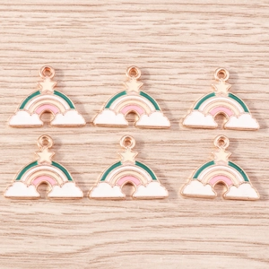 Detail of colorful rainbow star cloud enamel charms with rose gold alloy loops for DIY jewelry