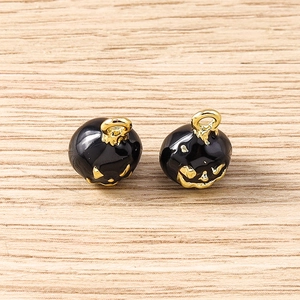 Paire de pendentifs citrouille d'Halloween noir et or pour bijoux sur bois