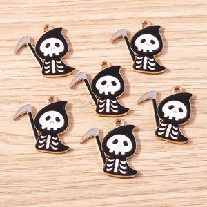 Detailed view of six cartoon grim reaper pendants with golden edges and scythe for DIY jewelry