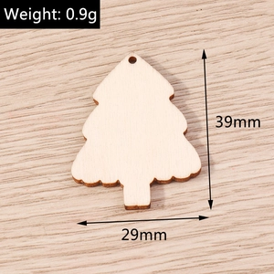 Macro detail of Christmas tree wooden pendant showing 39x29mm size and natural wood grain