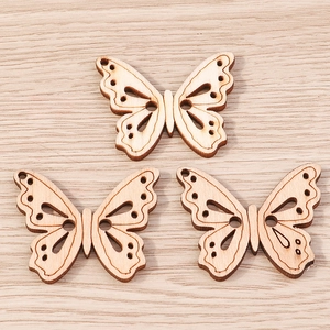 Detailed view of laser-cut butterfly wooden buttons for DIY crafts and jewelry making