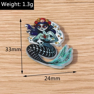 Macro view of skeleton mermaid acrylic pendant detailing 33mm height and 1.3g weight